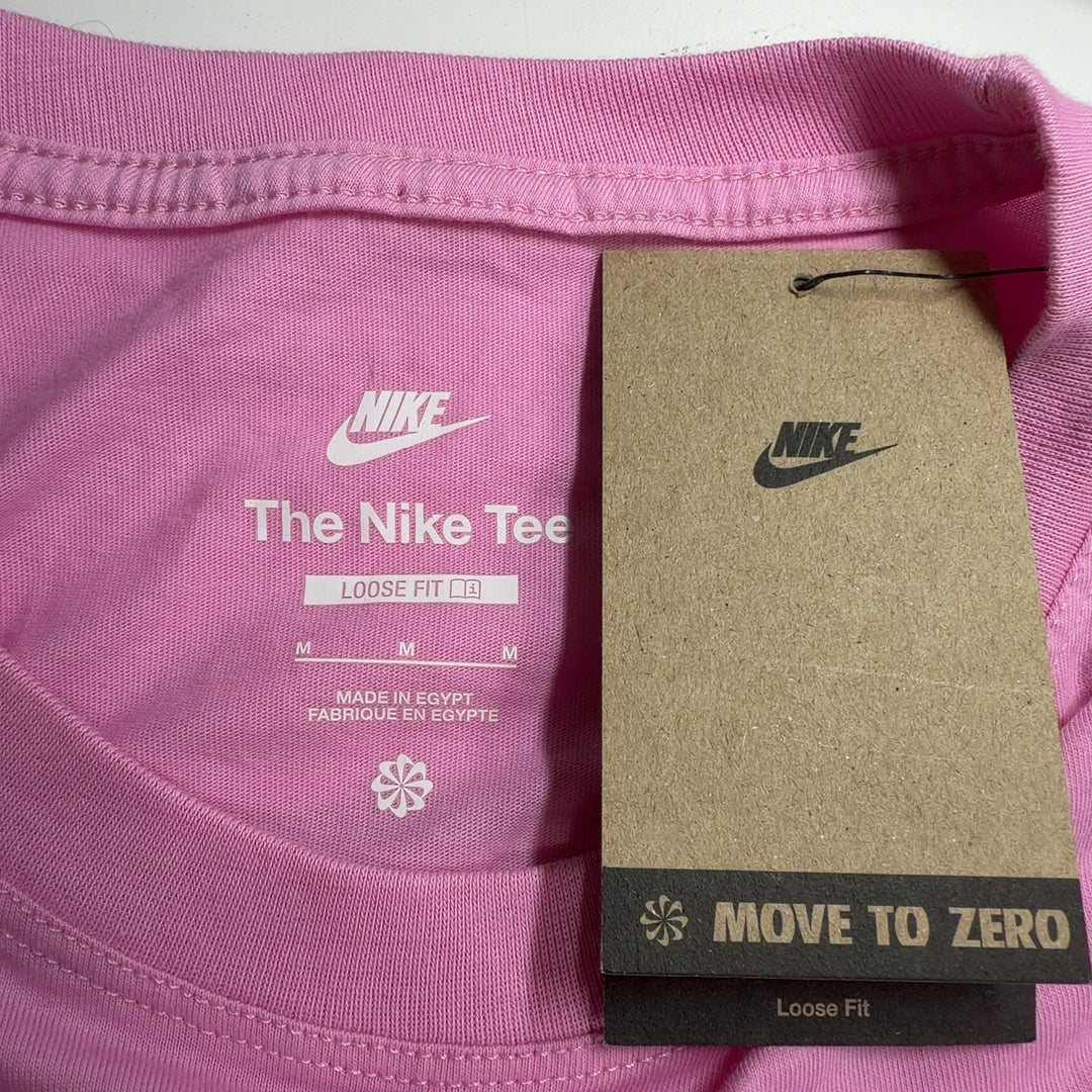 Pink cotton Nike oversized t-shirt back view, showing relaxed fit and length