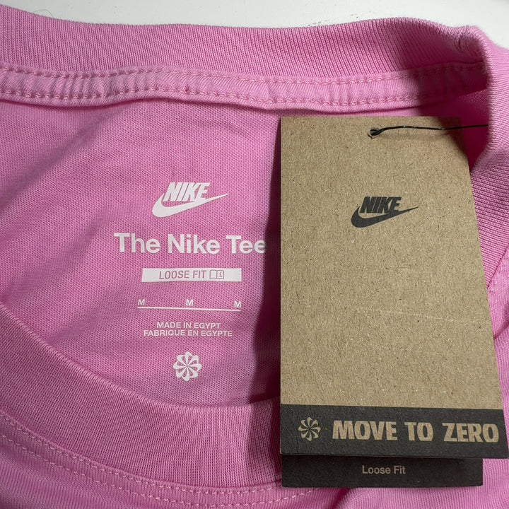 Pink cotton Nike oversized t-shirt back view, showing relaxed fit and length