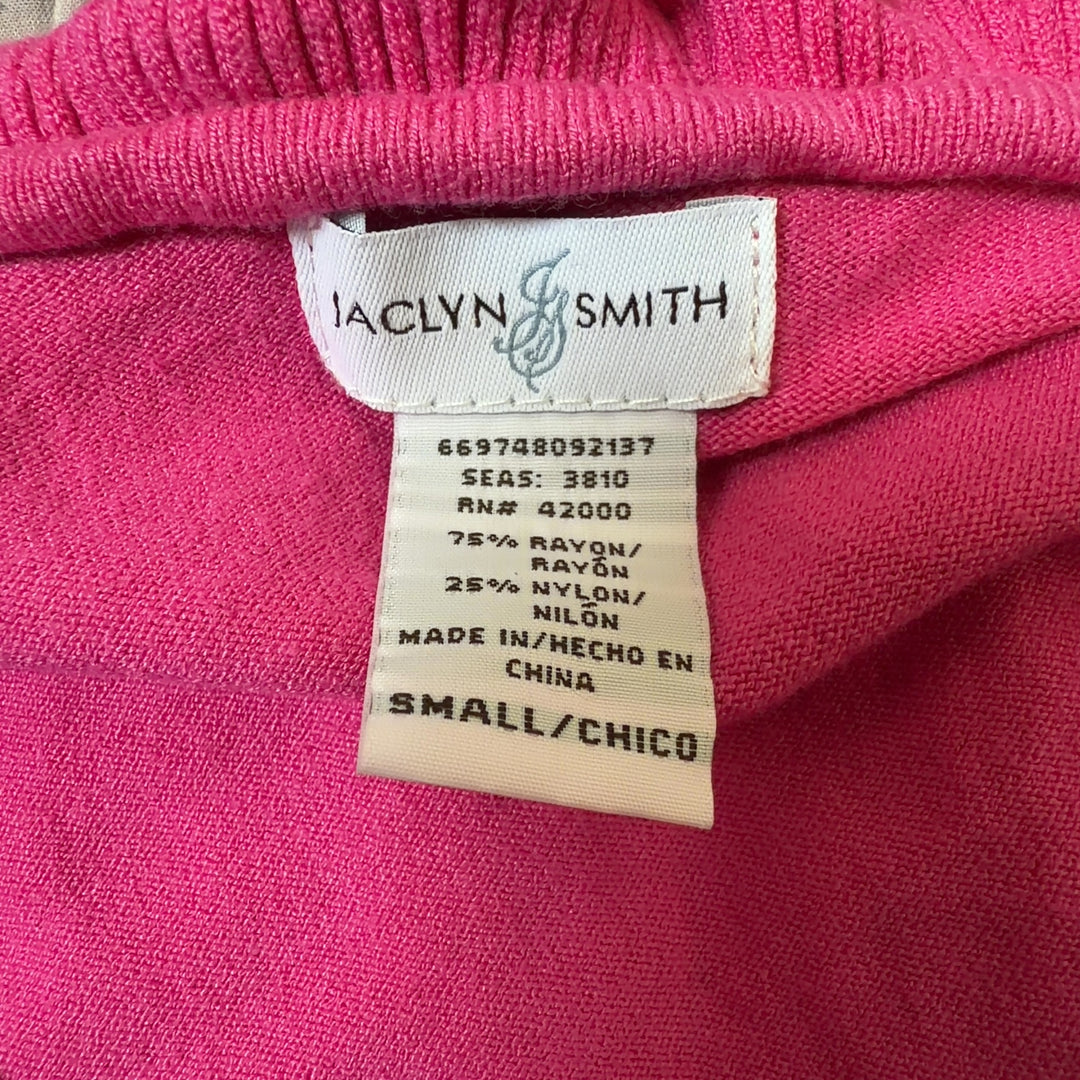 Pink ruffle V-neck short sleeve top, back view showing ruffled neckline