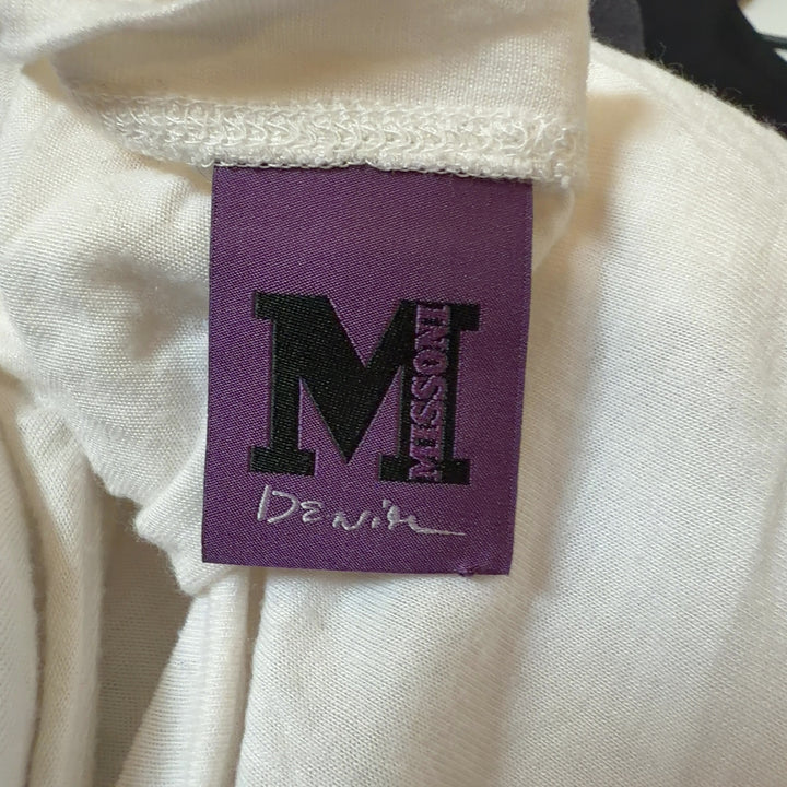 Tag view of cream M Missoni viscose top showing relaxed fit and tassel detail placement