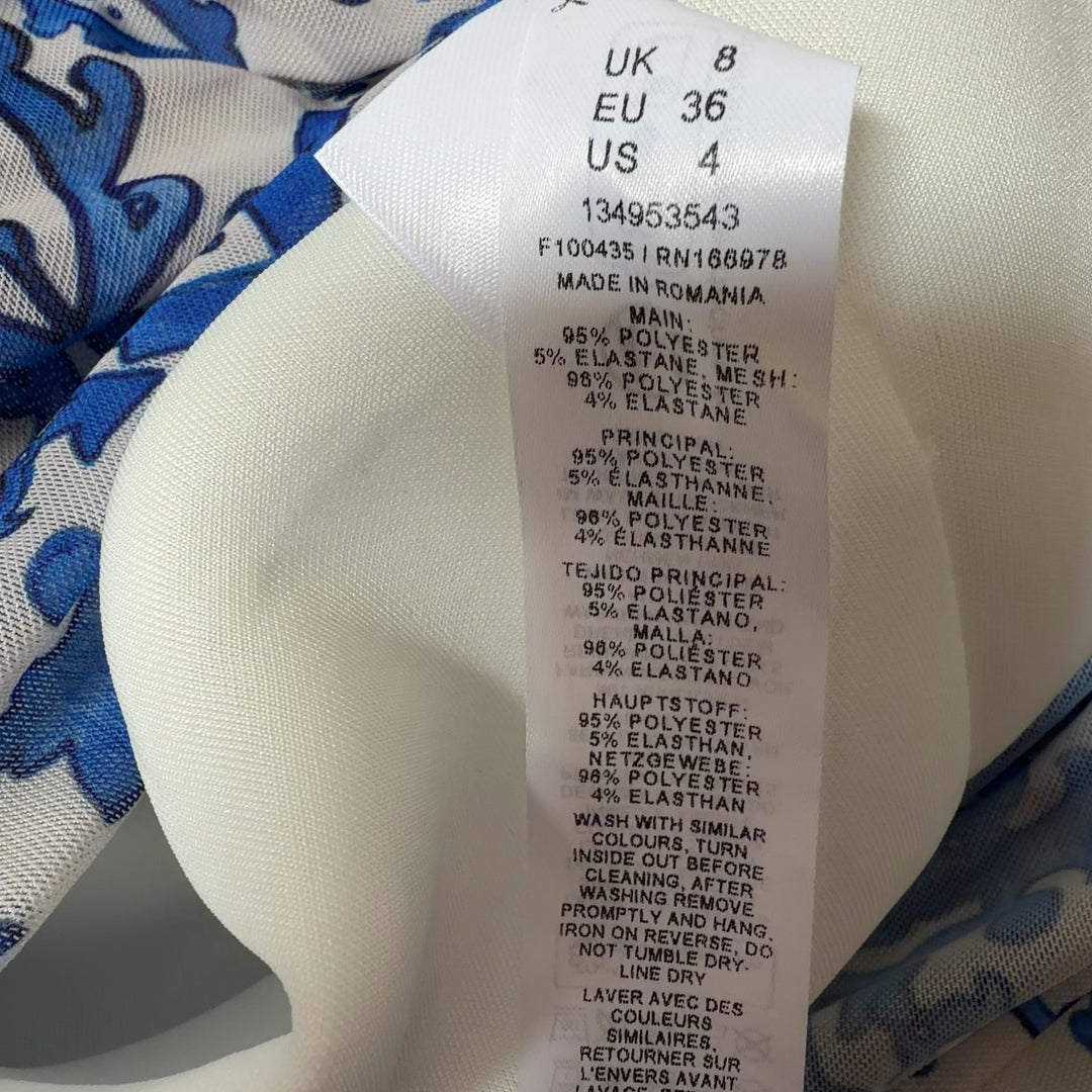 Blue and cream floral strapless maxi dress with fitted bodice and ruched detailing, back view