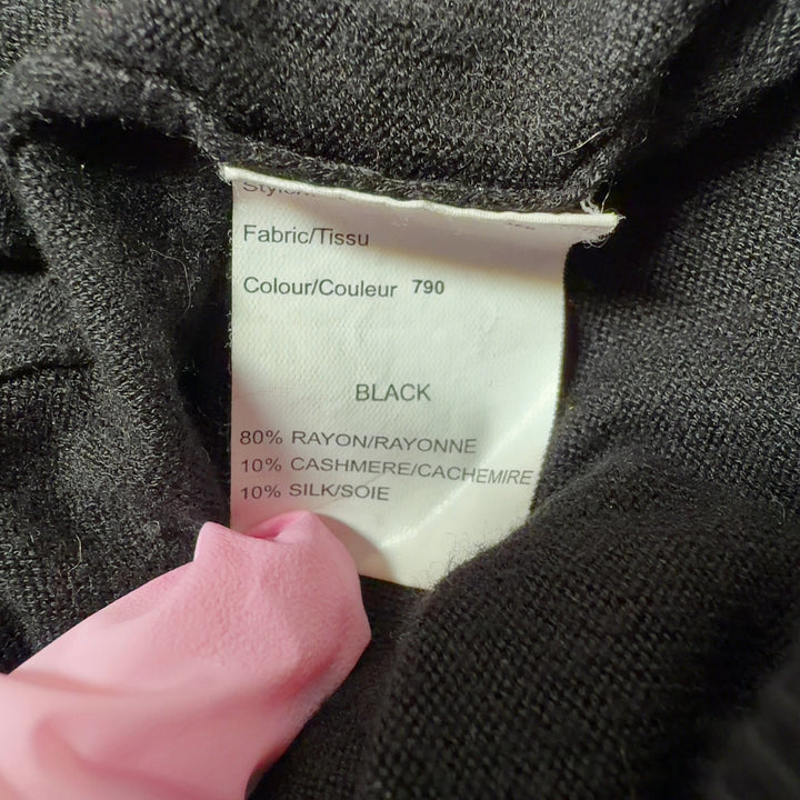 Black off-shoulder cashmere blend top with draped neckline, back view