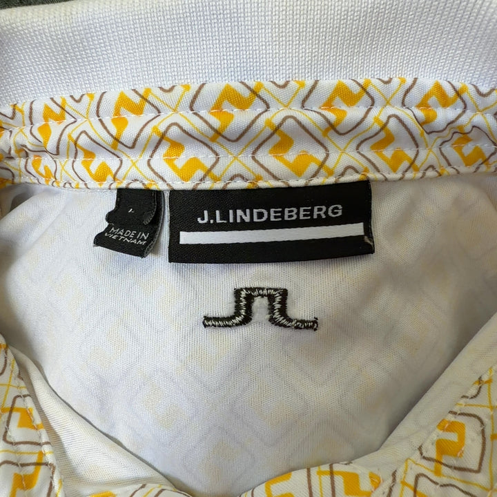 J. Lindeberg yellow geometric print polo shirt back view, showing full design and fit on model