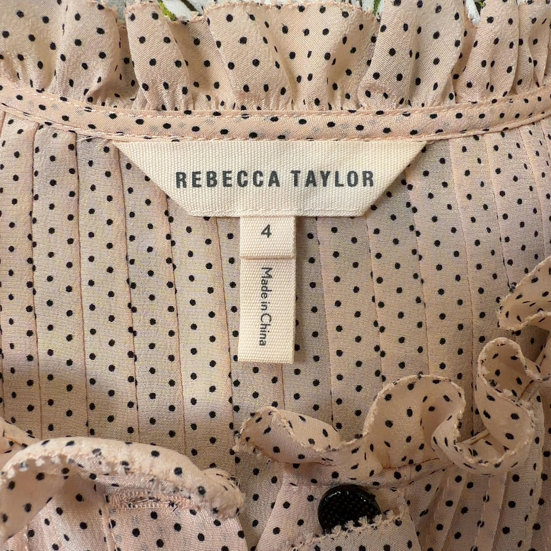 Tag view of cream silk pleated blouse showing relaxed fit and long sleeves