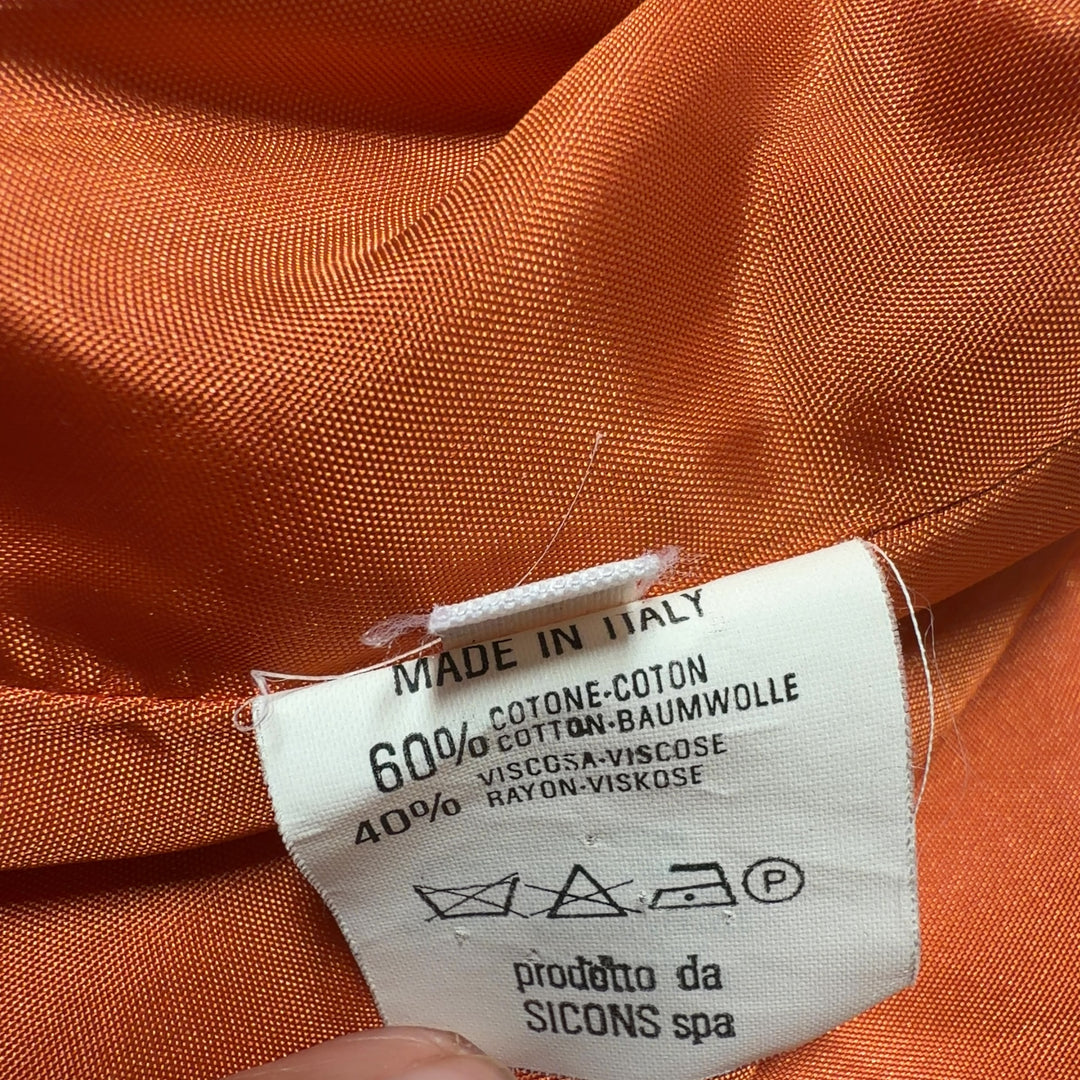 Orange cropped blazer with jeweled buttons by Emporio Armani, back view