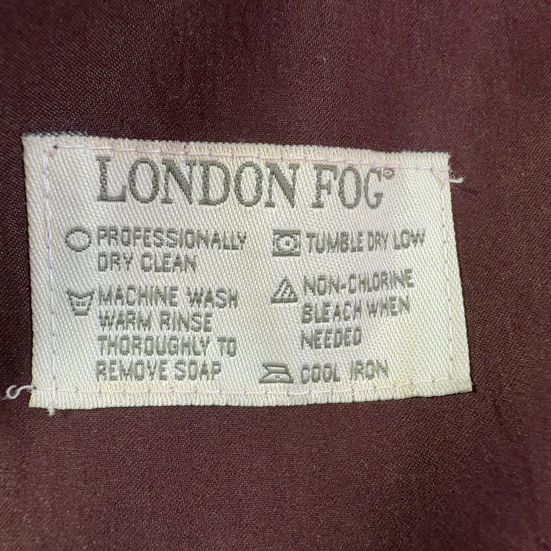 Burgundy double-breasted trench coat with adjustable belt, back view showing midi length