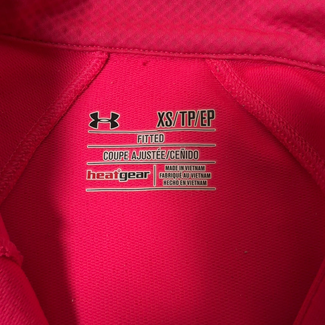Pink half-zip athletic long sleeve top back view on model