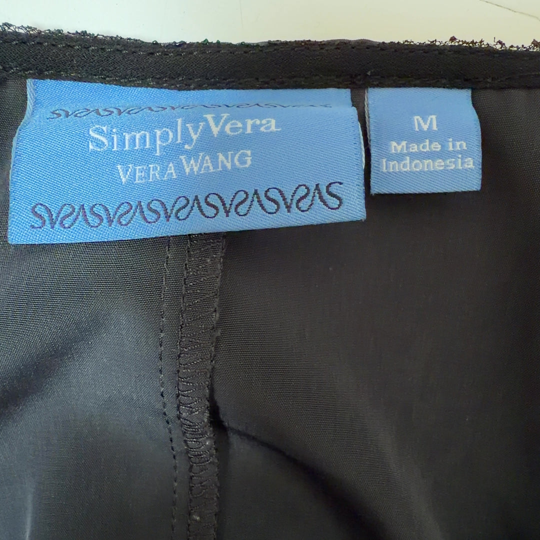 Black mesh overlay tank dress by Simply Vera Vera Wang, back view on model