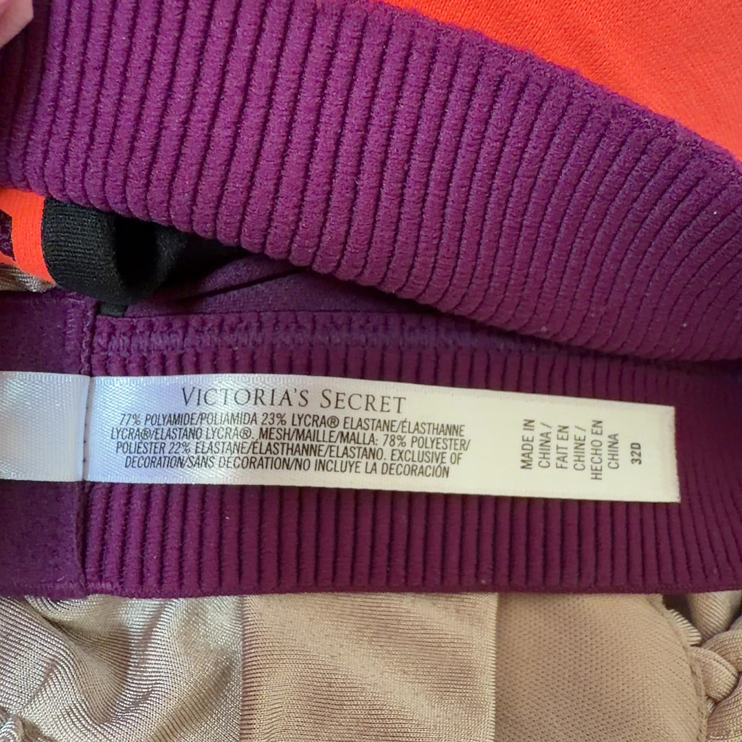 Coral VSX Sport sports bra with black trim, back view showing supportive design