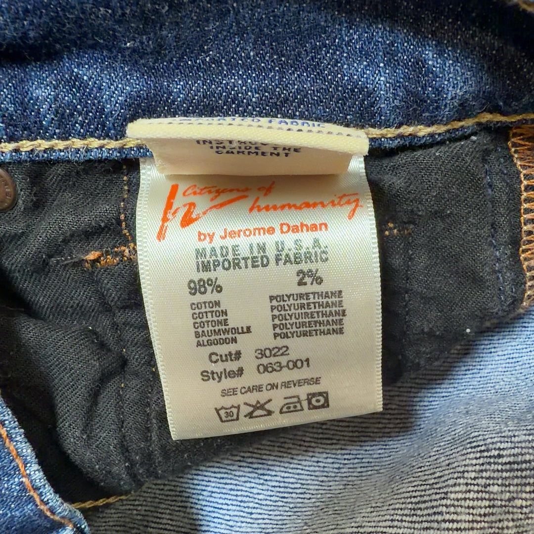 Tag view of blue denim cropped flare jeans by Citizens of Humanity showing flattering flare cut and cropped length at knee