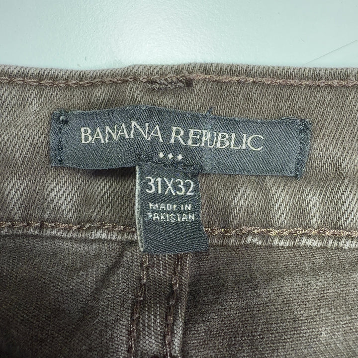 Brown denim straight-leg jeans back view, showing classic pocket design and straight-leg silhouette