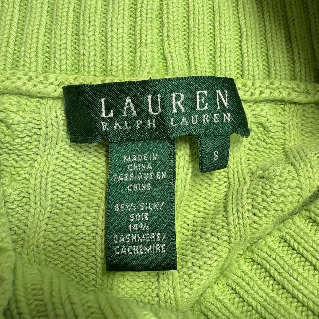 Tag view of lime green cashmere silk cropped sweater showing cable knit design and cowl neckline