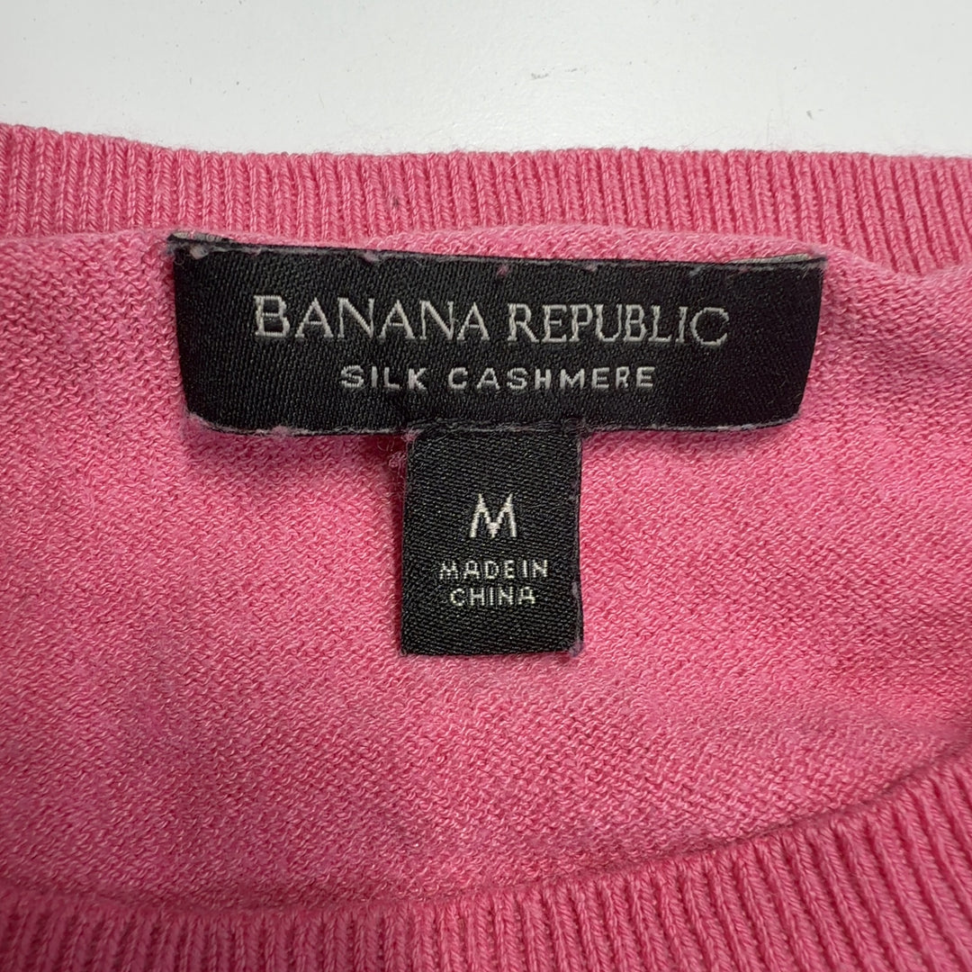 Pink cashmere silk crew neck sweater back view on model