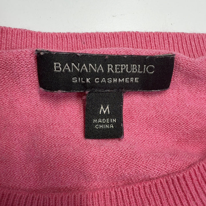 Pink cashmere silk crew neck sweater back view on model