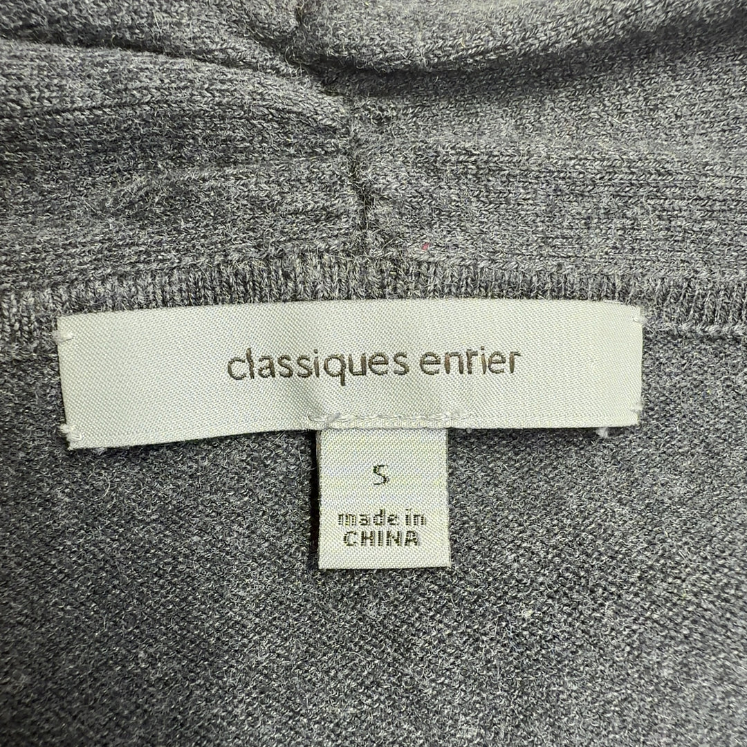 Tag view of charcoal cashmere cowl neck sweater showing fitted design and elegant draping