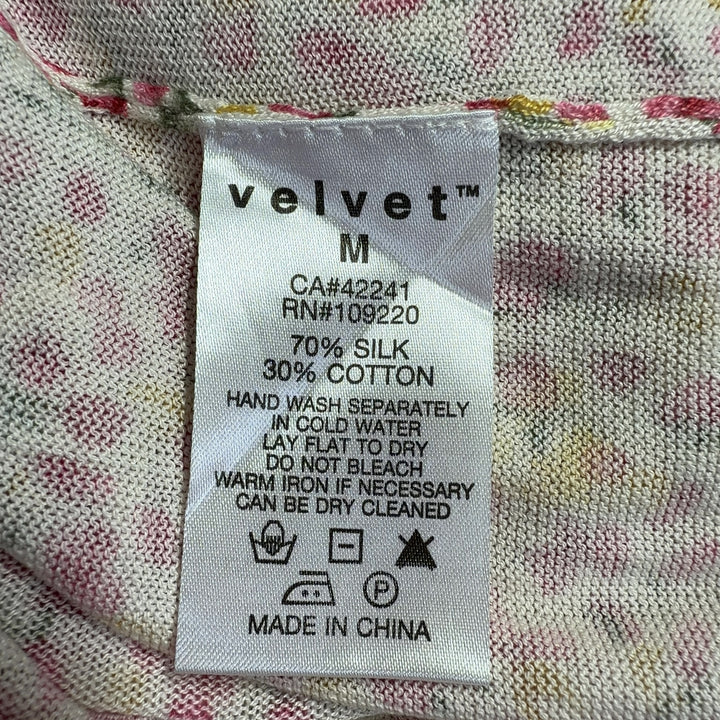 Pink floral cotton silk cardigan with button-front closure, back view