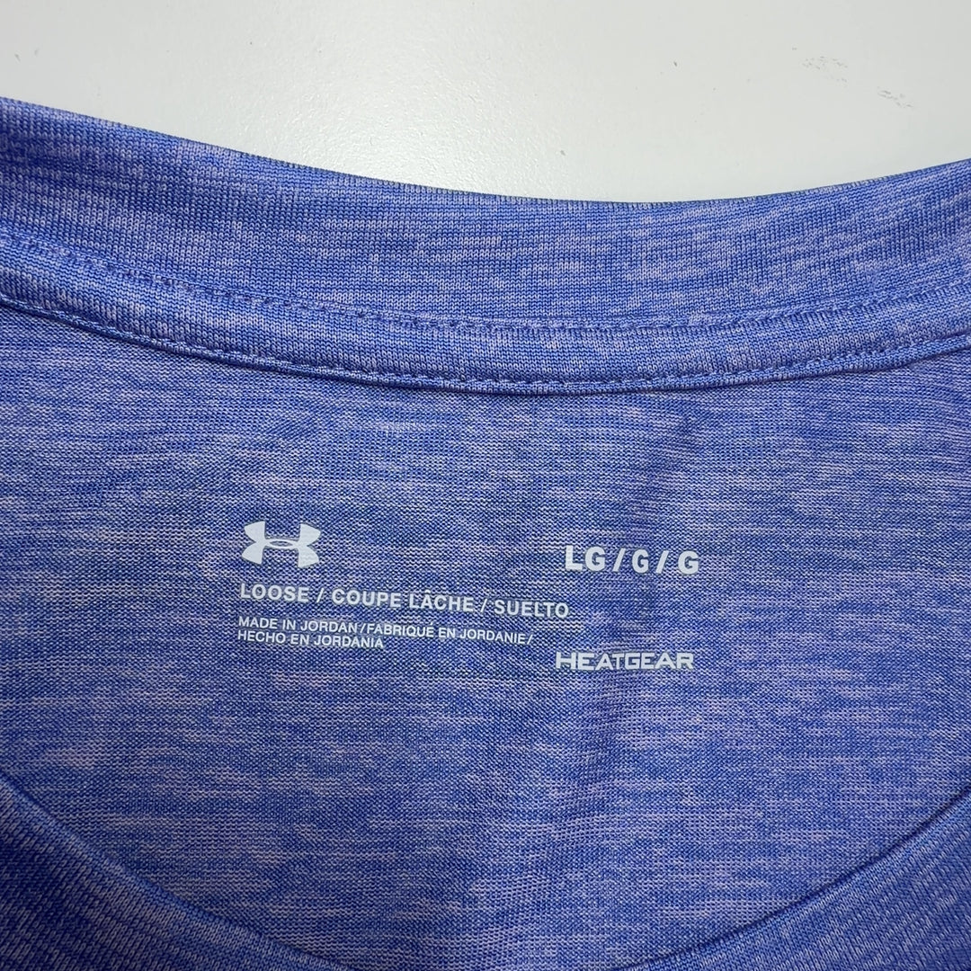 Tag view of heathered blue Under Armour activewear t-shirt showing relaxed fit and design details