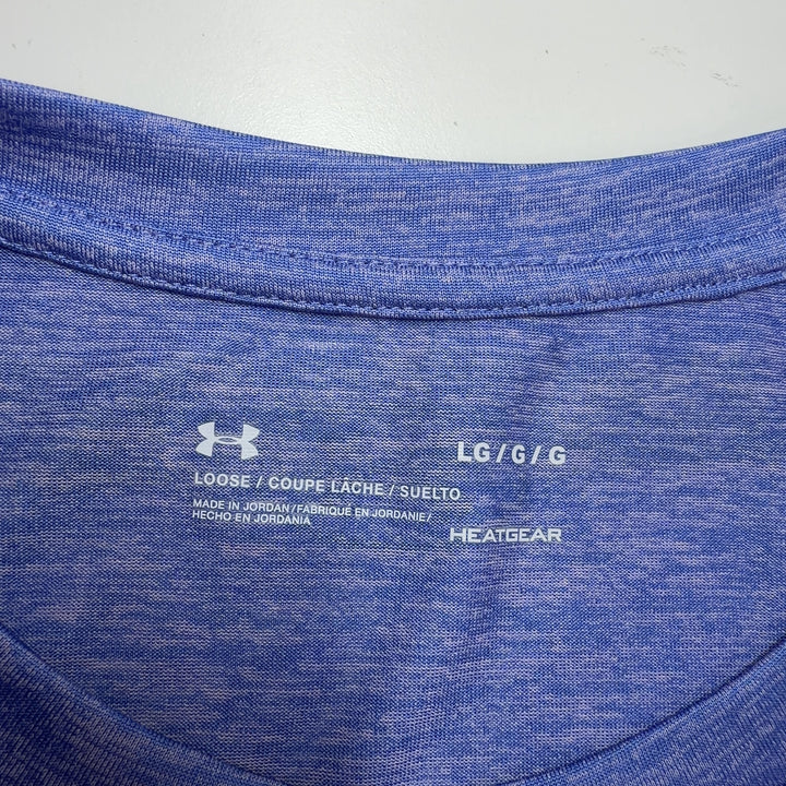 Tag view of heathered blue Under Armour activewear t-shirt showing relaxed fit and design details