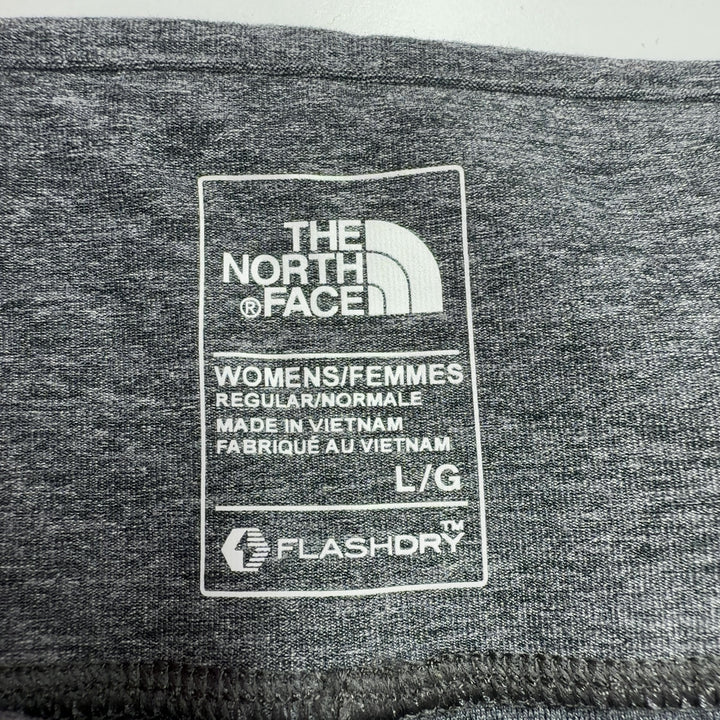 Gray heathered capri leggings with high-waisted waistband, back view