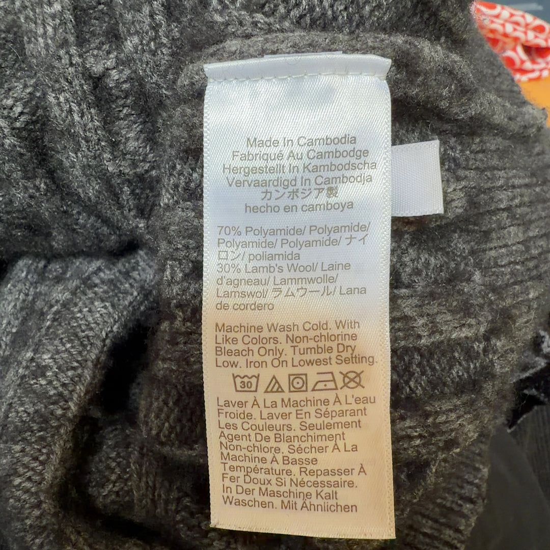 Charcoal gray cable knit turtleneck sweater by J.Crew, back view showing cable knit detail