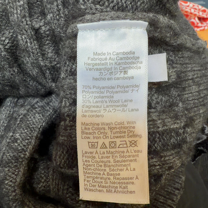 Charcoal gray cable knit turtleneck sweater by J.Crew, back view showing cable knit detail