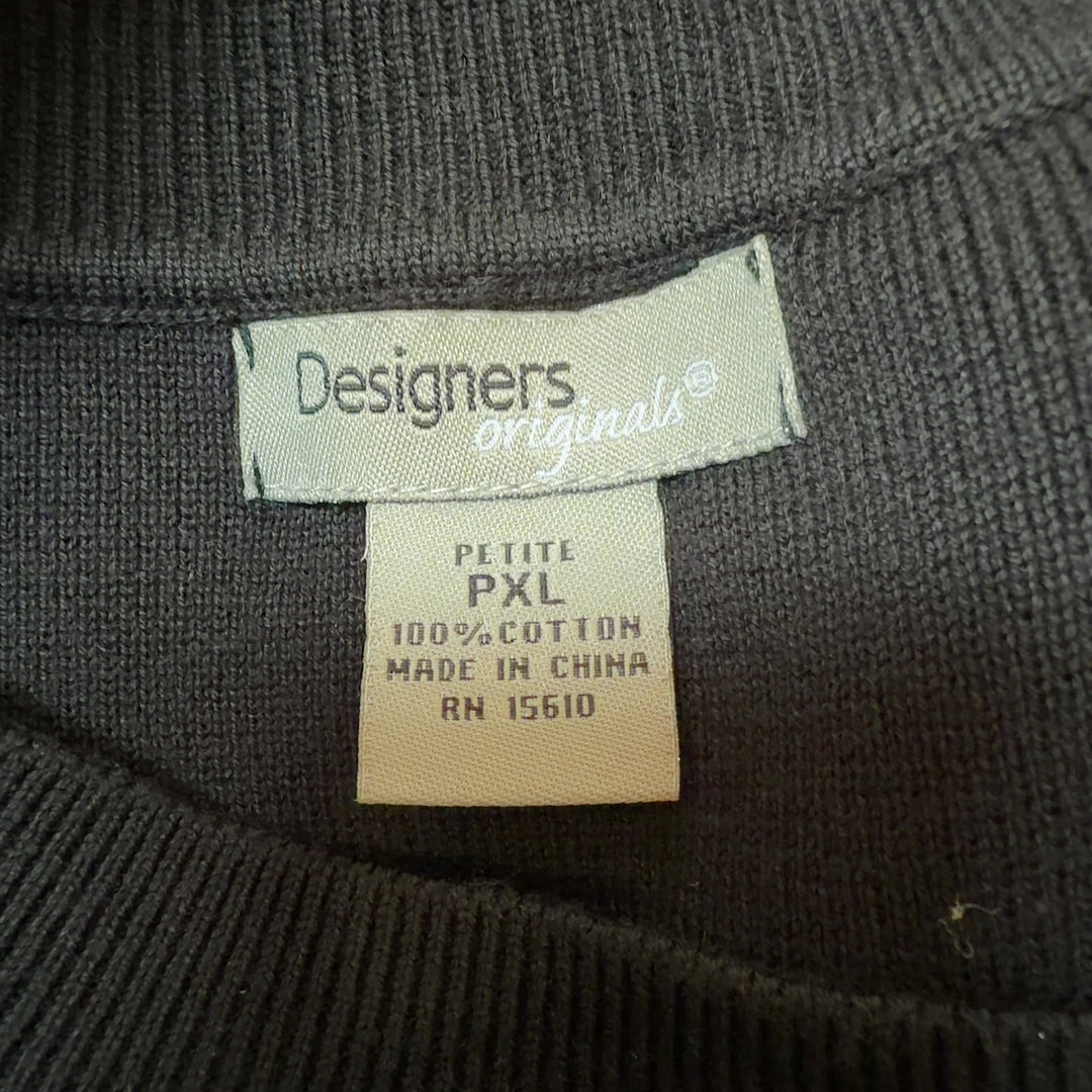 Black cotton top with keyhole neckline detail and 3/4 sleeves, back view