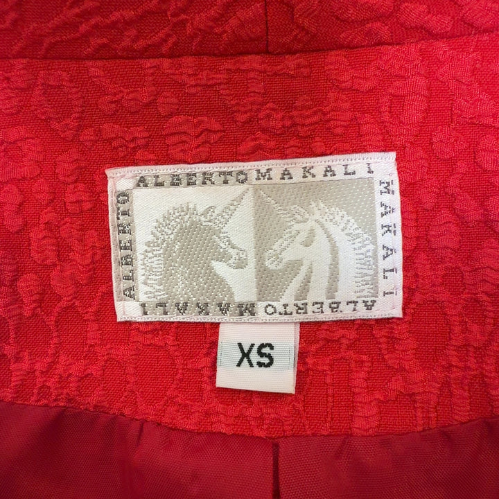Tag view of red textured blazer by Alberto Makali showing relaxed fit and three-quarter sleeve length