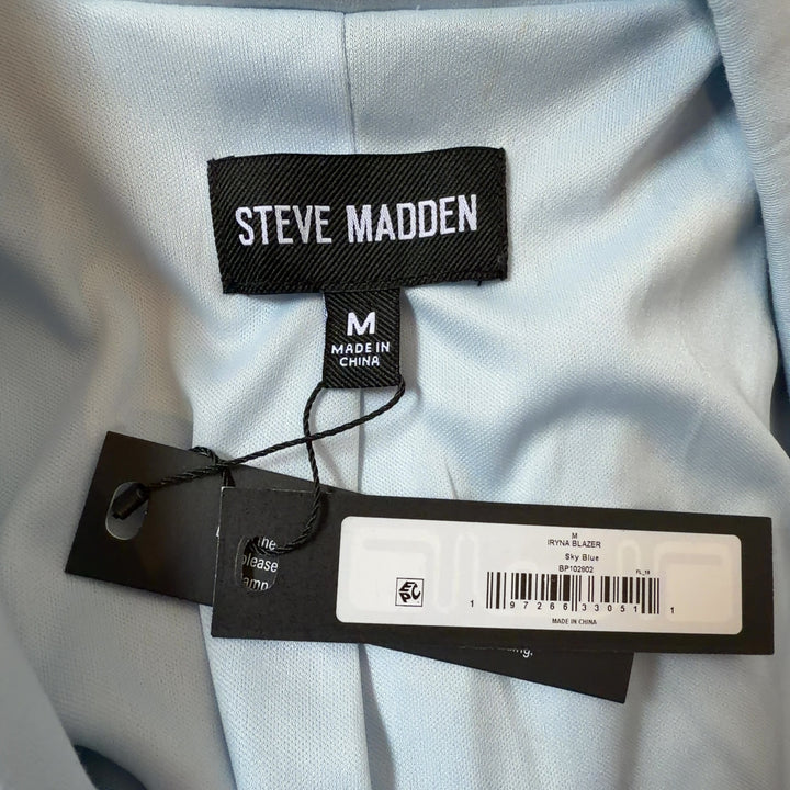 Light blue cropped blazer by Steve Madden back view displaying tailored silhouette and cropped hemline