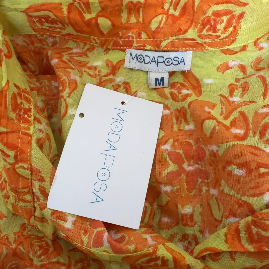Yellow and orange floral cotton maxi dress with self-tie waist belt and flowing tiered silhouette - back view