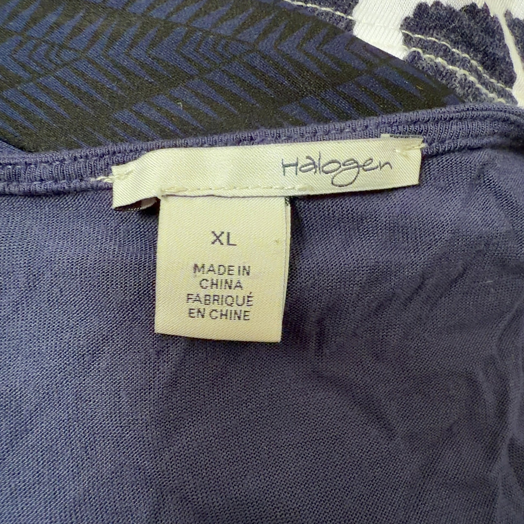 Navy cowl neck sleeveless top back view, showing draped neckline and relaxed fit