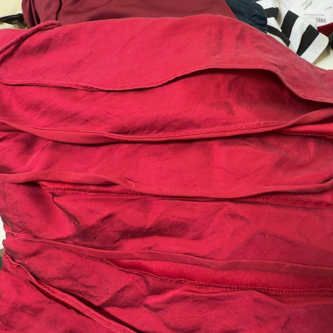 Red ruched midi cocktail dress with spaghetti straps, back view