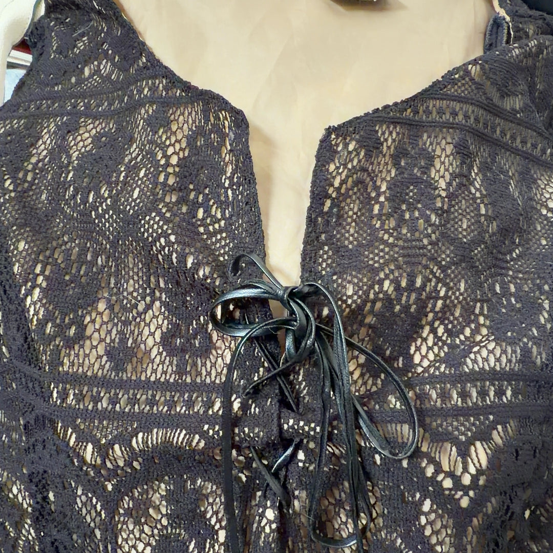 Black lace long sleeve top with tie closure detail, back view