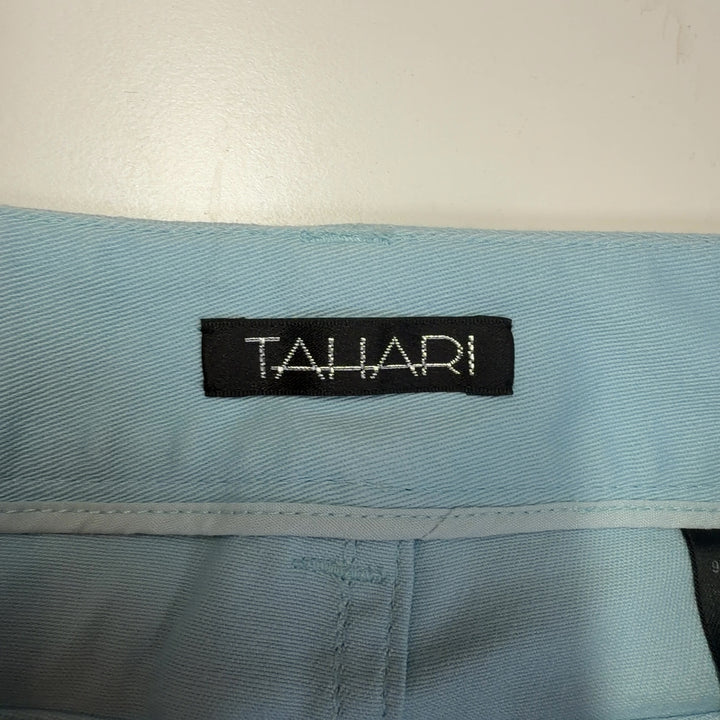 Light blue cotton-spandex straight-leg pants with high-waisted design, back view