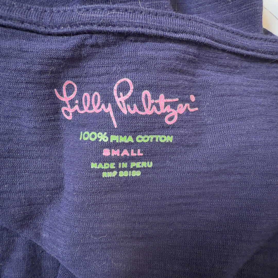 Navy Pima cotton ruffle sleeve dress by Lilly Pulitzer, back view on model