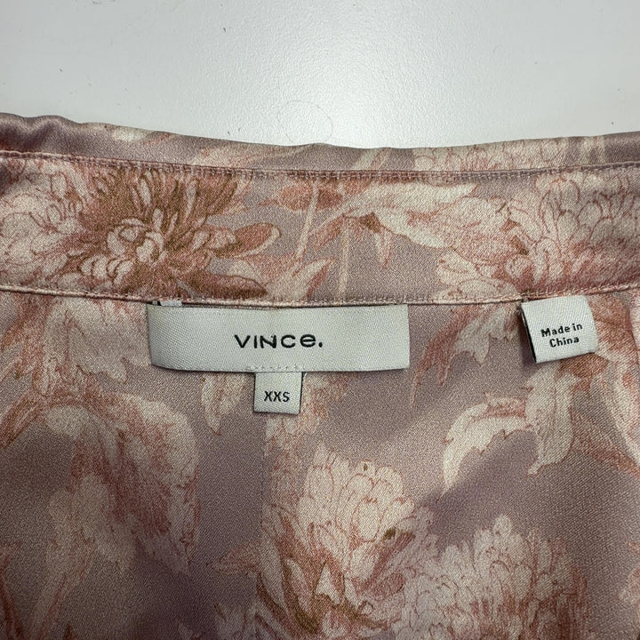 Blush floral silk button-up shirt by Vince, back view displaying full-length sleeves and relaxed fit silhouette