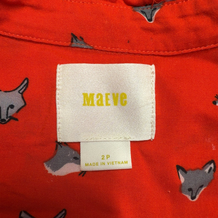 Red cat print button-up blouse with peplum waist detail, back view on model