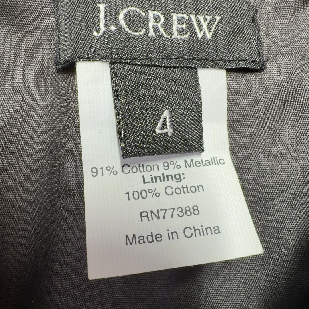 Black strapless J.Crew dress with ruched sweetheart neckline and gathered skirt, back view