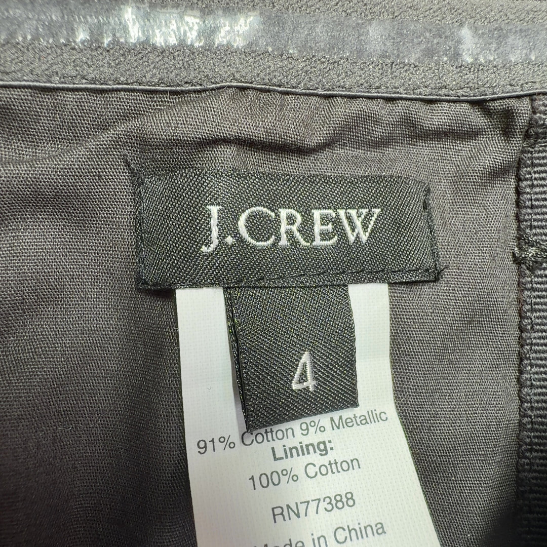 Black strapless J.Crew dress with ruched sweetheart neckline and gathered skirt, back view