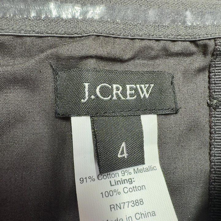 Black strapless J.Crew dress with ruched sweetheart neckline and gathered skirt, back view