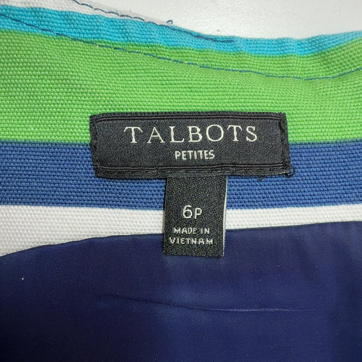 Tag view of multicolor striped cotton dress showing sleeveless design and knee-length cut with horizontal stripe pattern