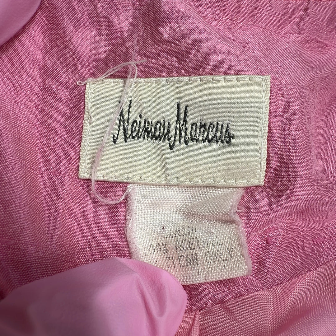 Pink button-front basic jacket by Neiman Marcus, back view on model