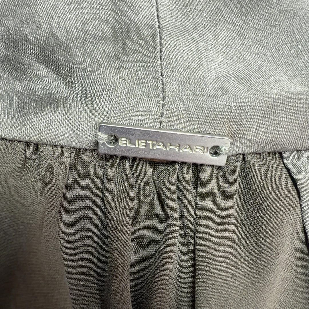 Gray silk halter tank top with tie-neck design, back view showing draping