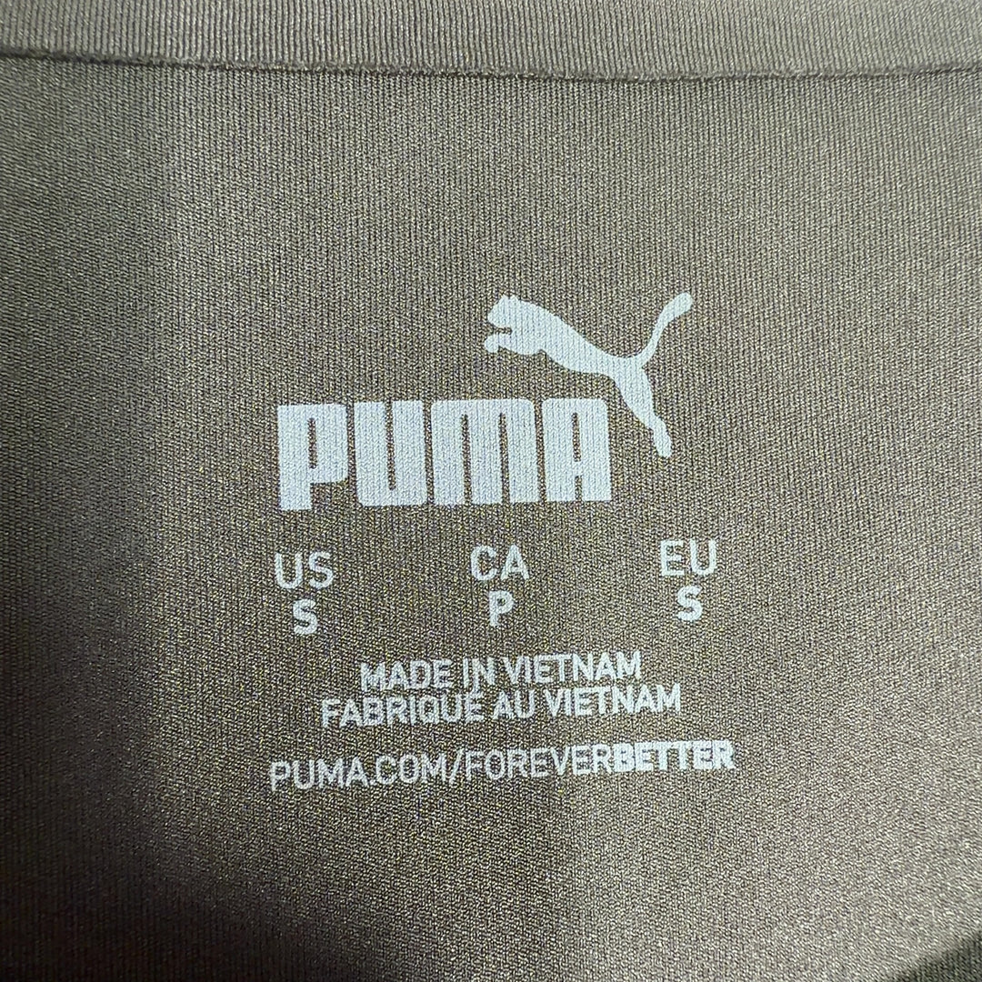 Black Puma athletic tank top back view showing mesh detailing and sleeveless design