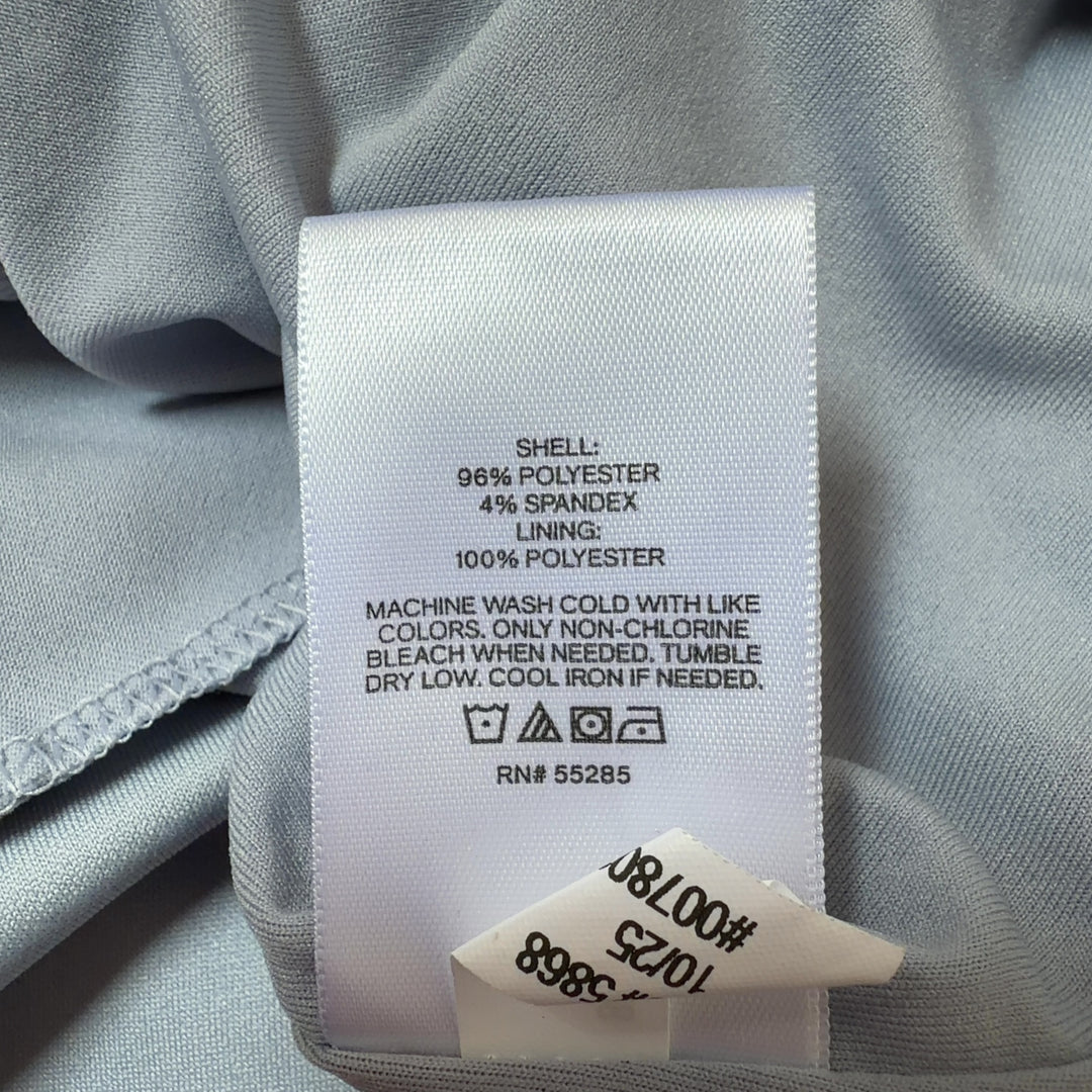 Gray cap sleeve shift dress back view showing functional side pocket and relaxed fit