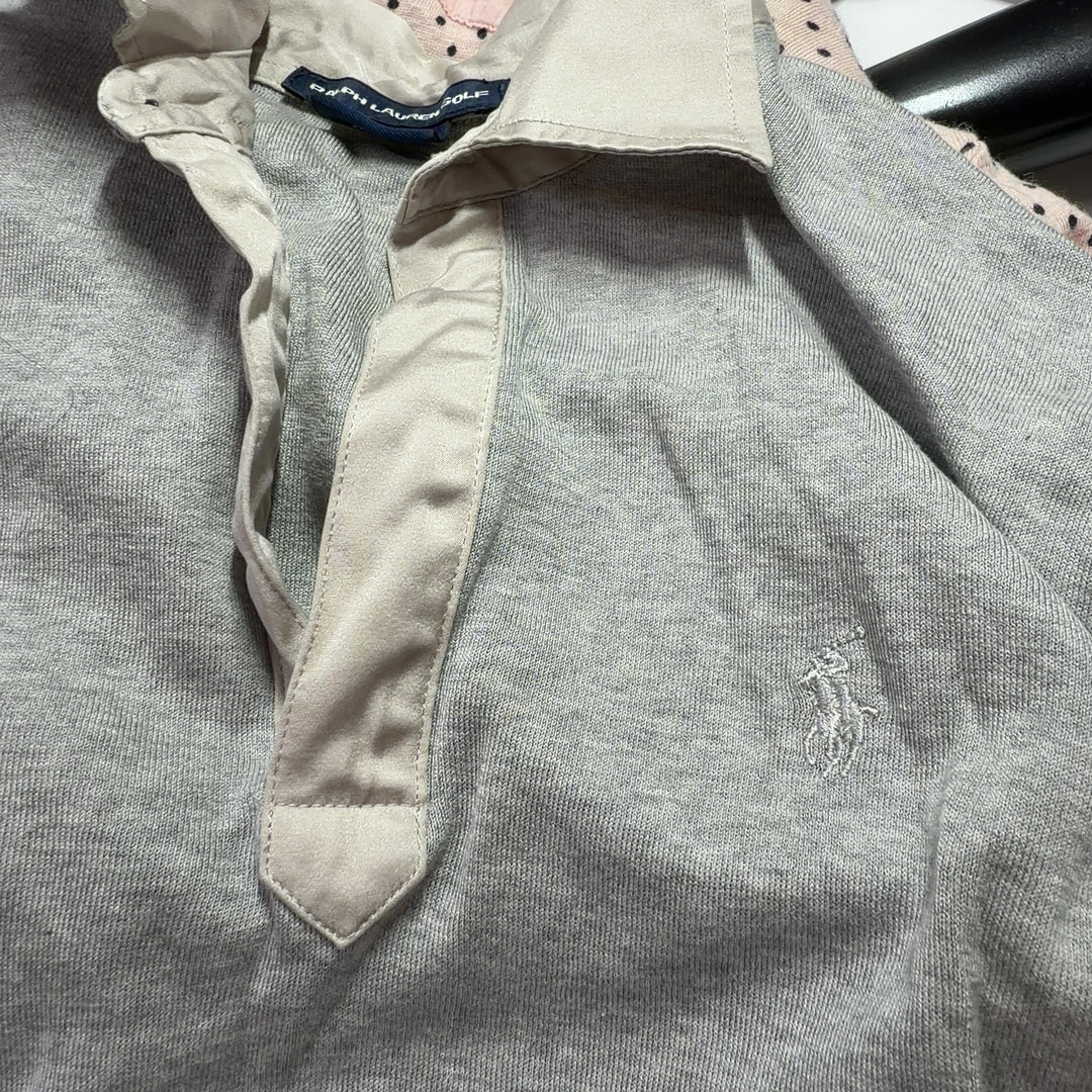 Beige cotton long sleeve golf polo back view showing relaxed fit and tailored silhouette