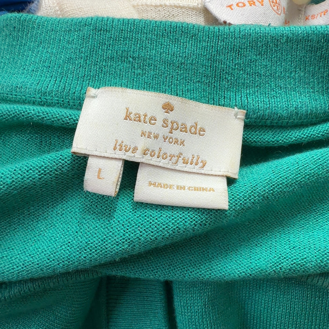 Tag view of Kate Spade green cardigan showing classic silhouette and button detailing