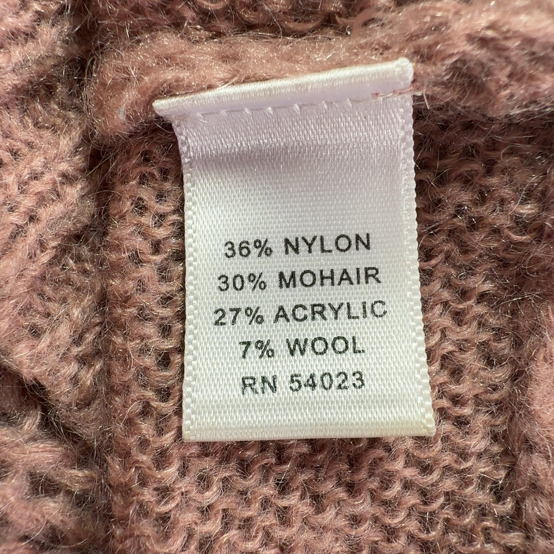 Tag view of beige cropped cardigan sweater showing textured knit pattern and three-quarter sleeves