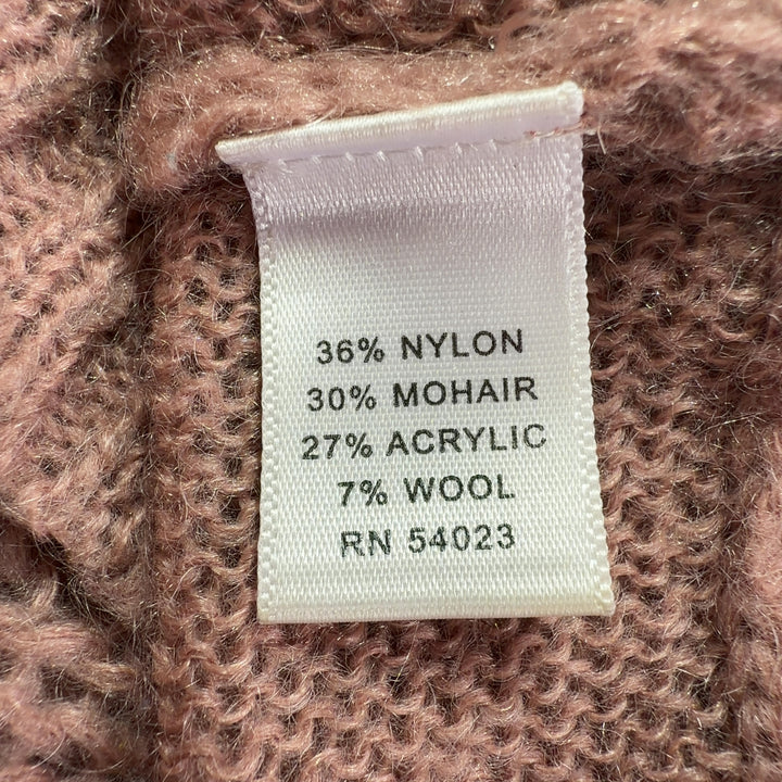 Tag view of beige cropped cardigan sweater showing textured knit pattern and three-quarter sleeves