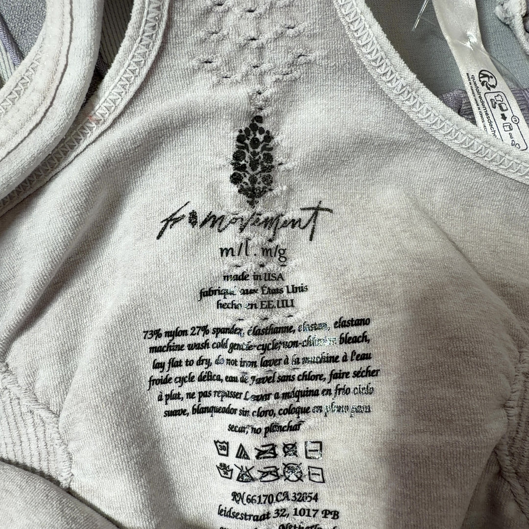 White racerback athletic tank top, back view showing supportive racerback design