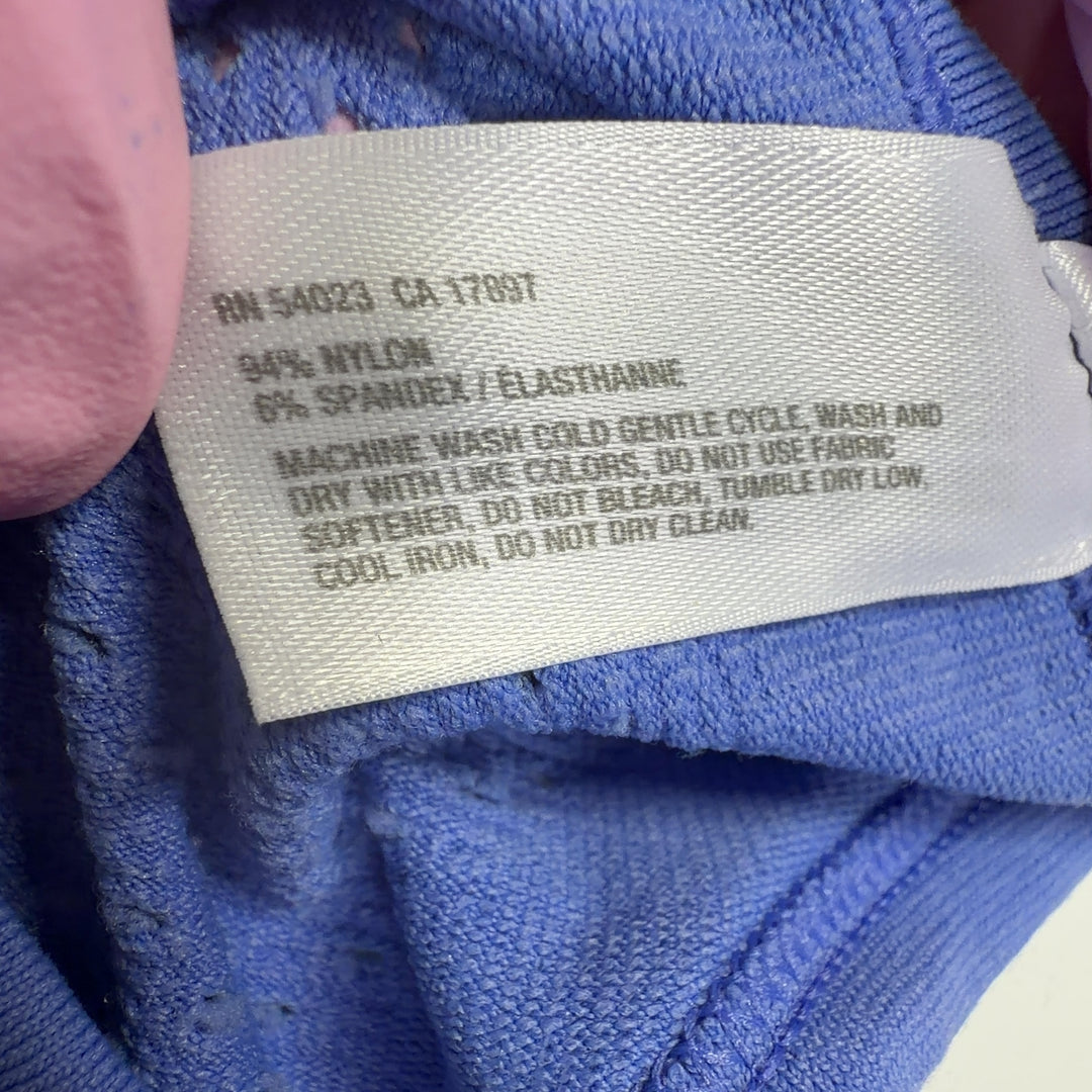Periwinkle blue racerback tank back view showing fitted silhouette and side ruching